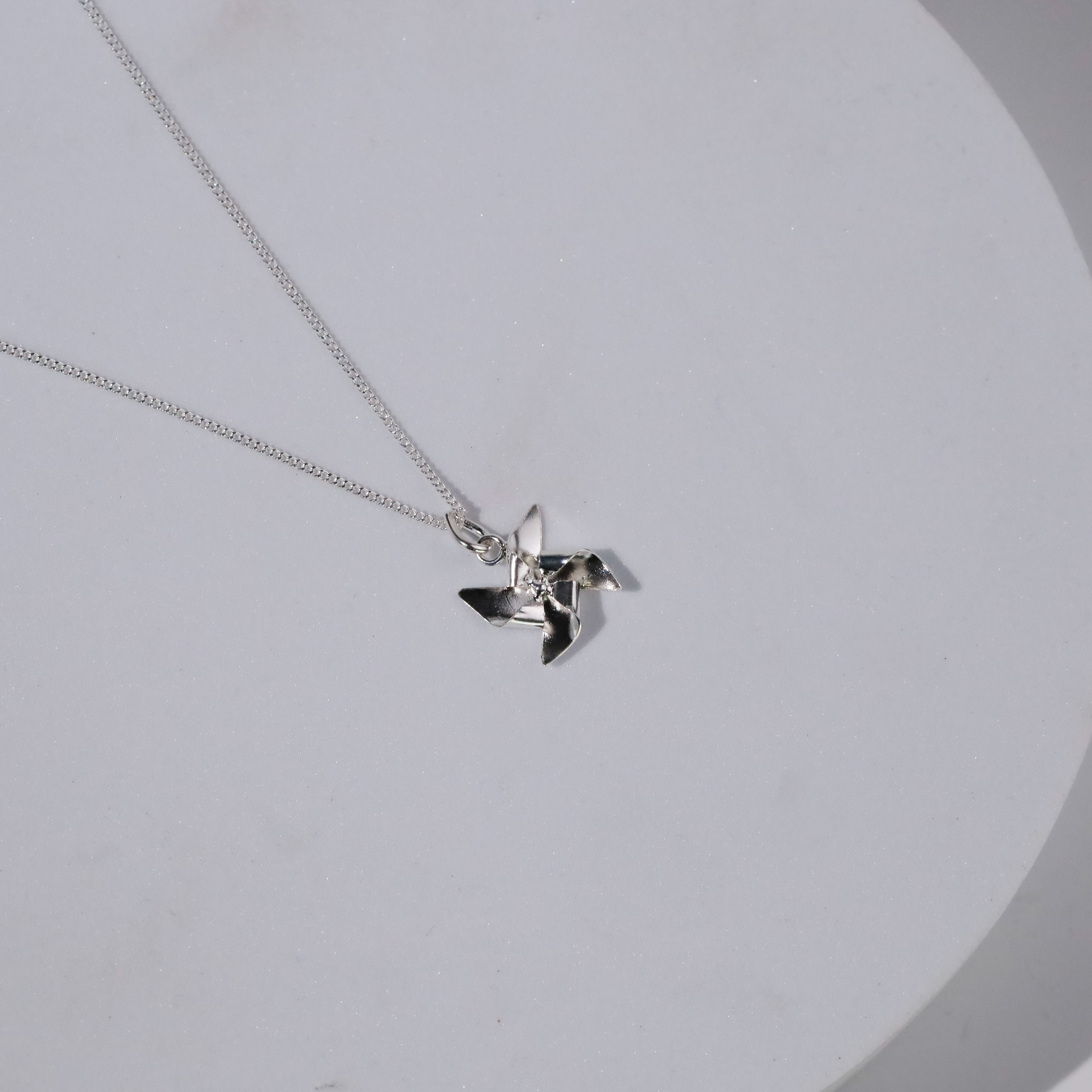 Pinwheel Necklace - Fold collection ( Shiny Silver Finish )