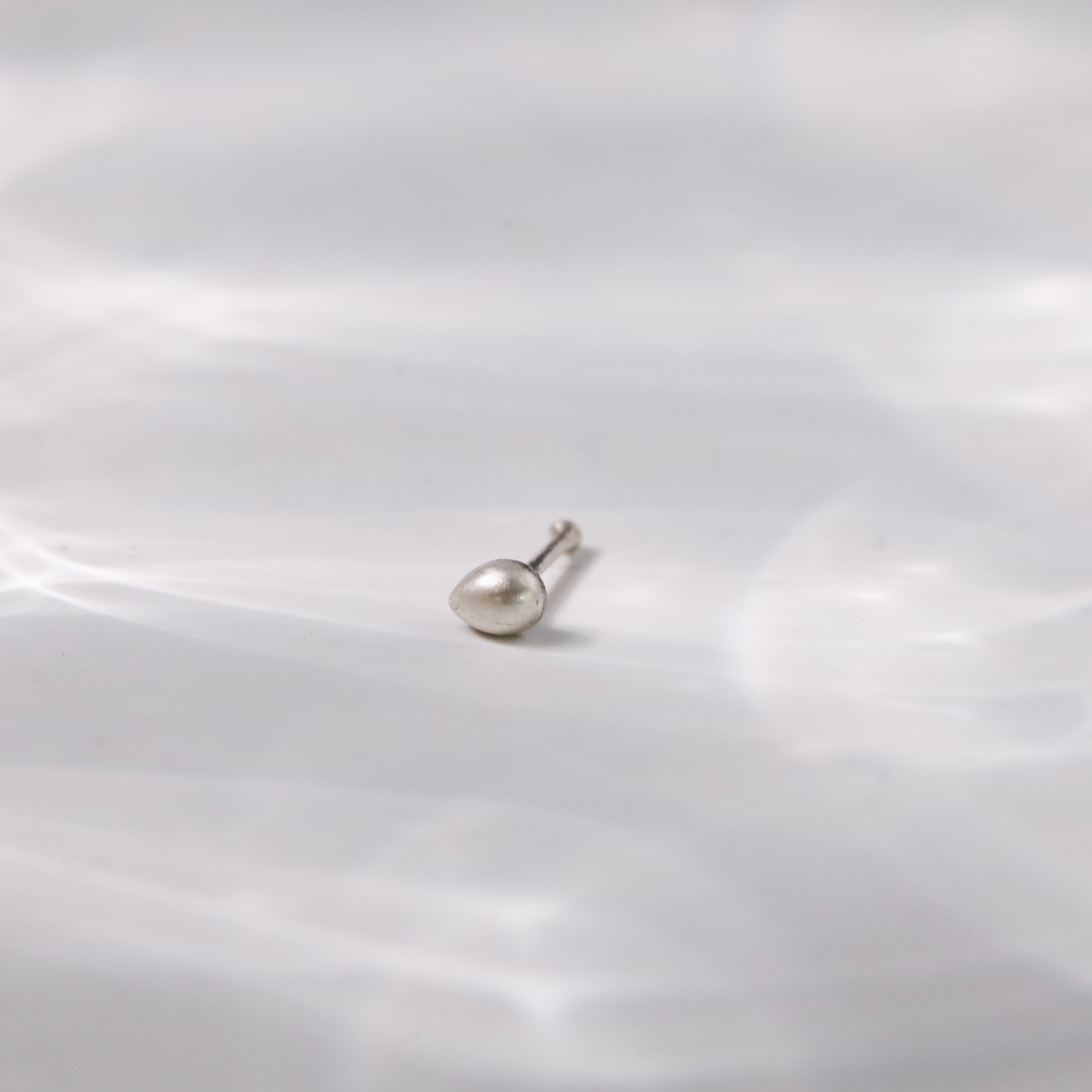 style tiny silver nose pin traditional outfit