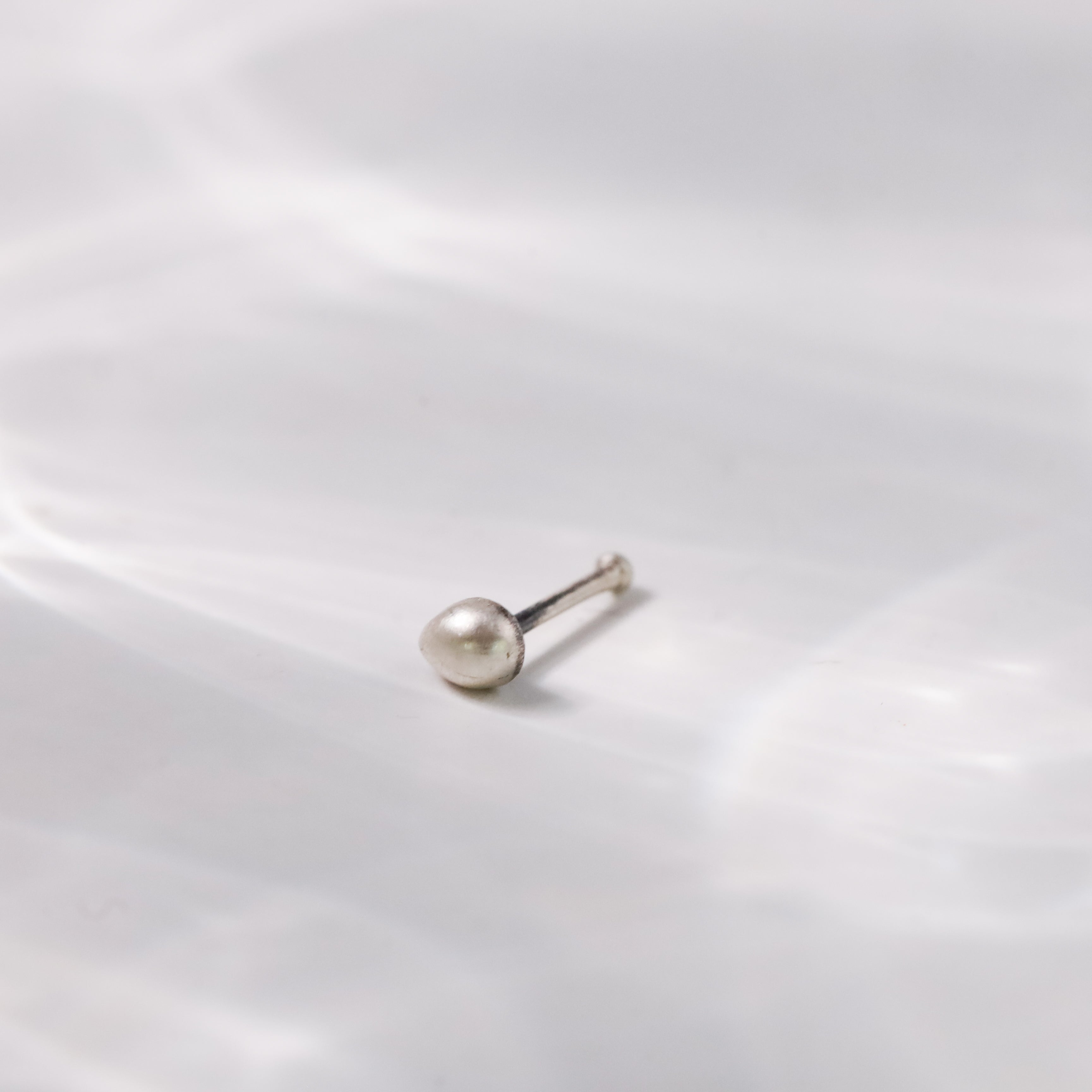 Handcrafted silver tiny nose pin polished finish