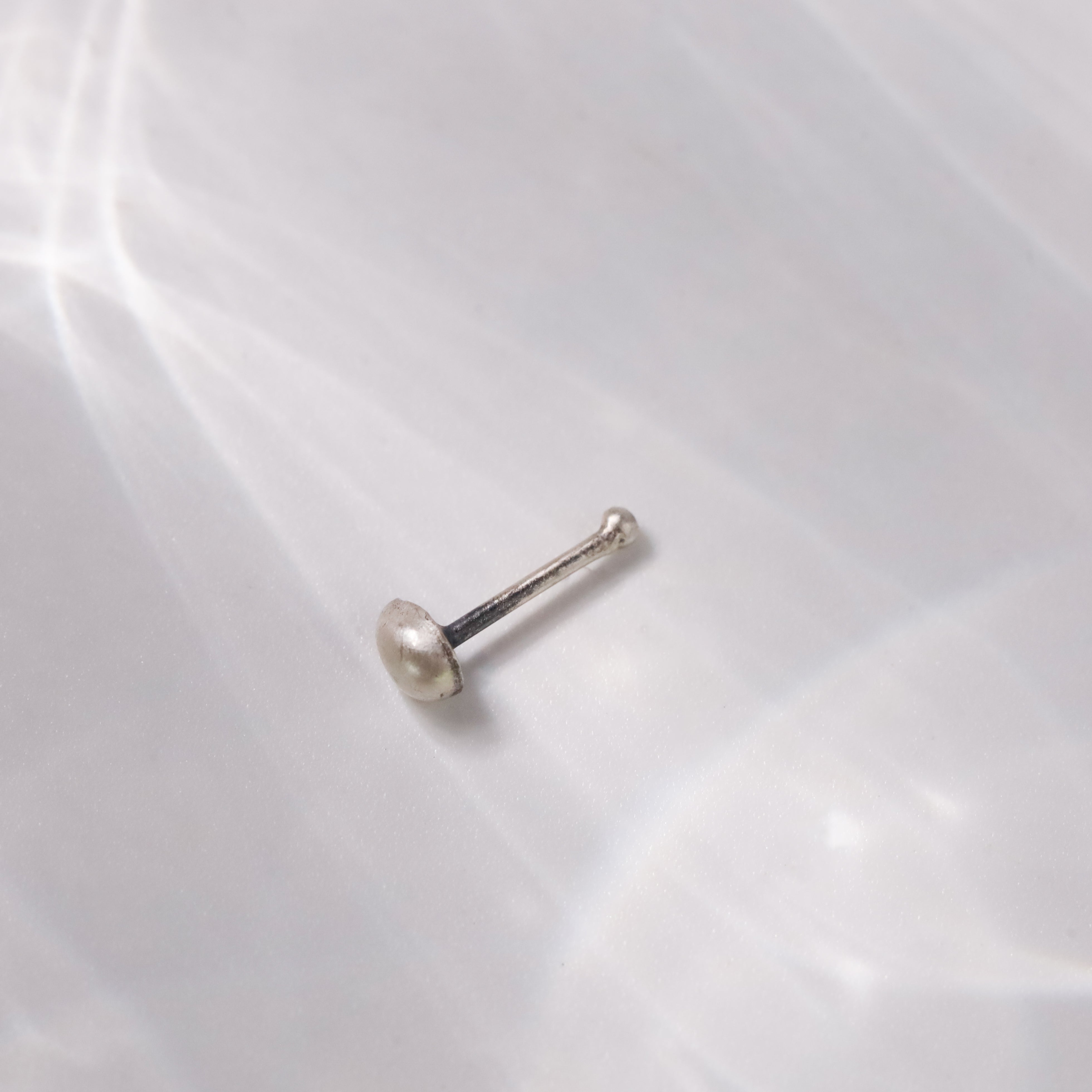 wear Silver Tiny Nose Pin everyday look