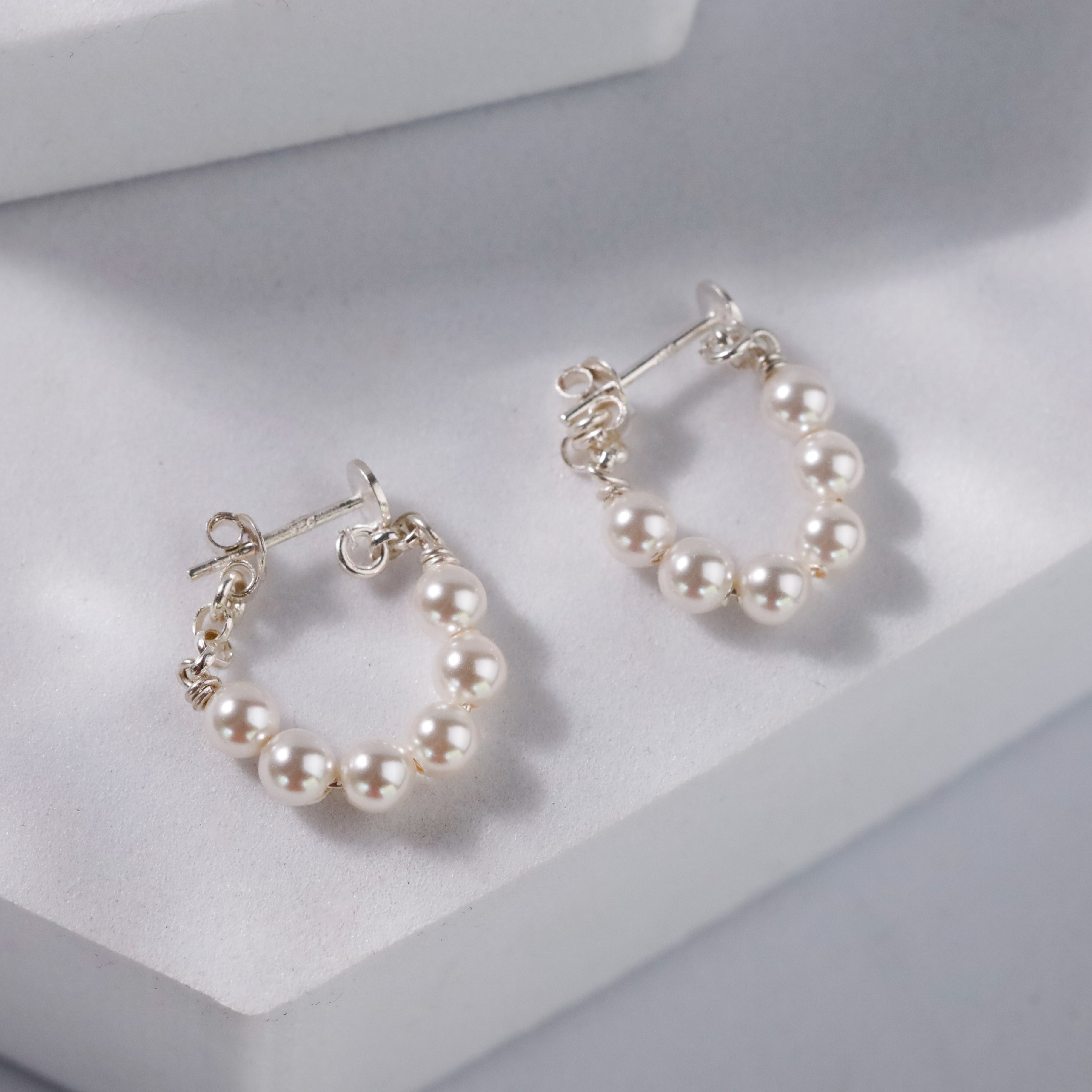 Pearl halo earrings refined design