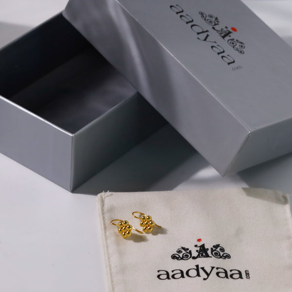 Gold floral earrings with jewelry box
