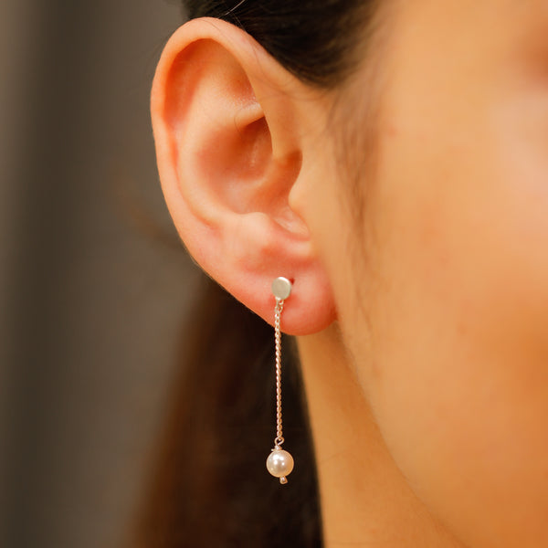 Pearl chain earring showing delicate craftsmanship