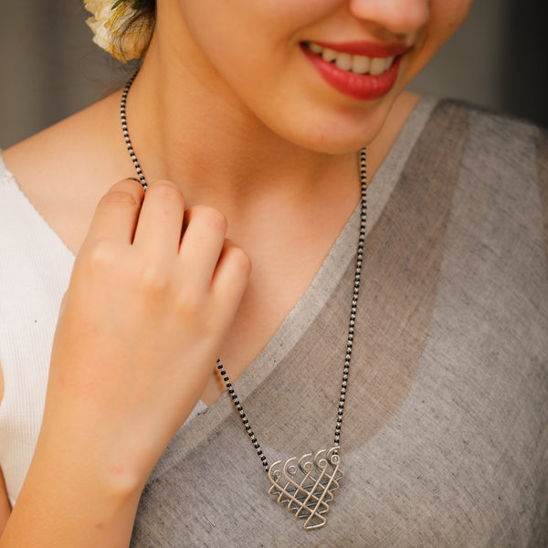 Medium Saraswati motif silver mangalsutra detailing