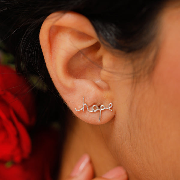 Hope earrings in sterling silver with handwritten style design for jewelry and accessories