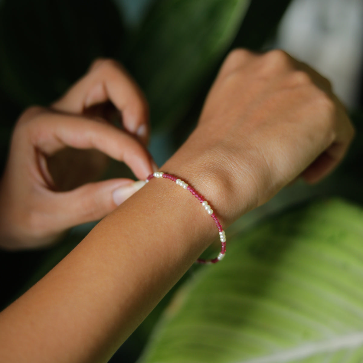 Semi precious stone bracelet in silver wire ( Lab made rubies and pearls )