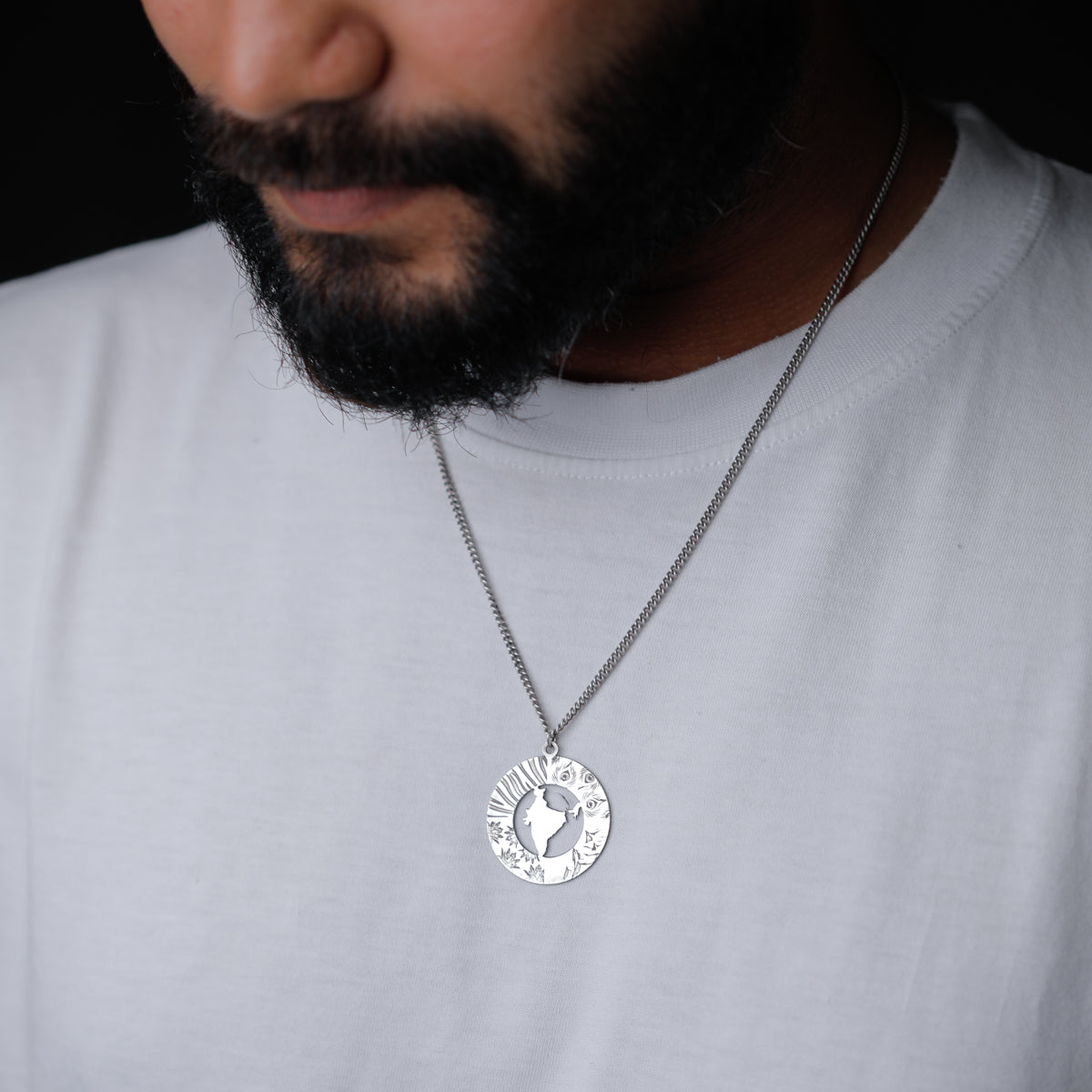 India motif detailing on silver necklace