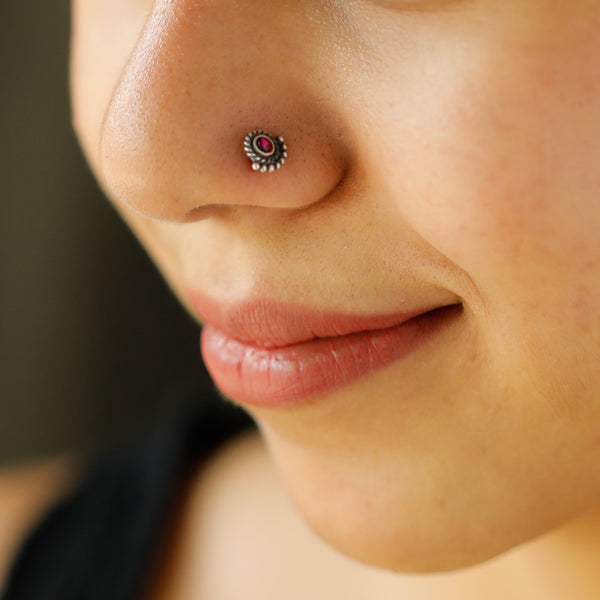 Silver crescent nose pin with pink gemstone for everyday wear