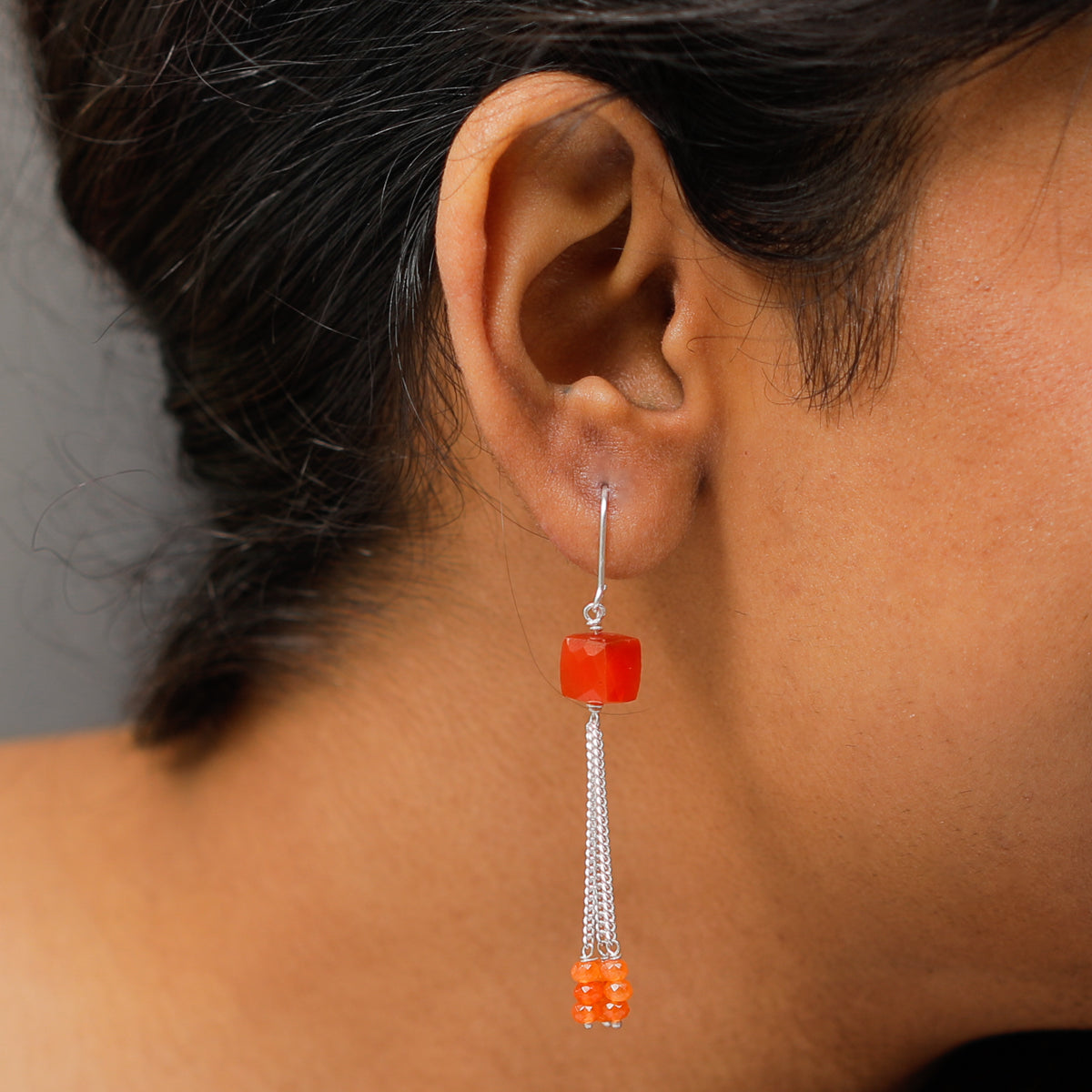 Carnelian silver dangler earrings close-up handcrafted detailing