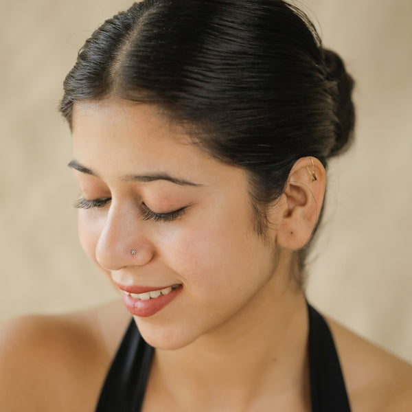 Silver nose pin with floral design
