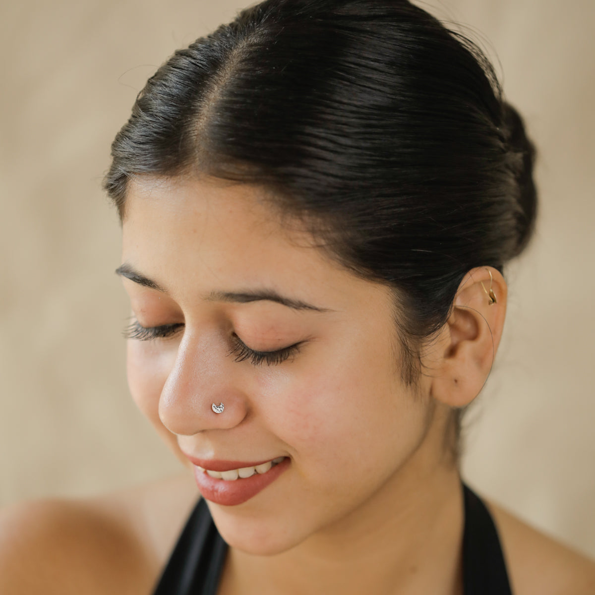 Model wearing Silver Tiny Hammered Chandrakor Nose Pin