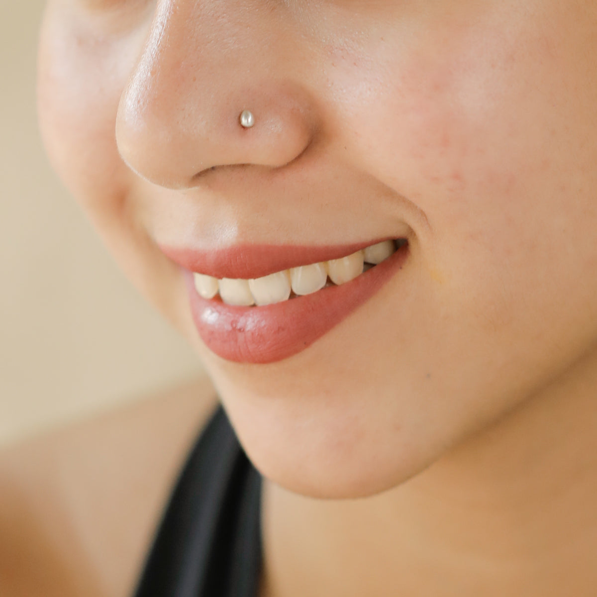 Model wearing Silver Tiny Nose Pin for everyday look