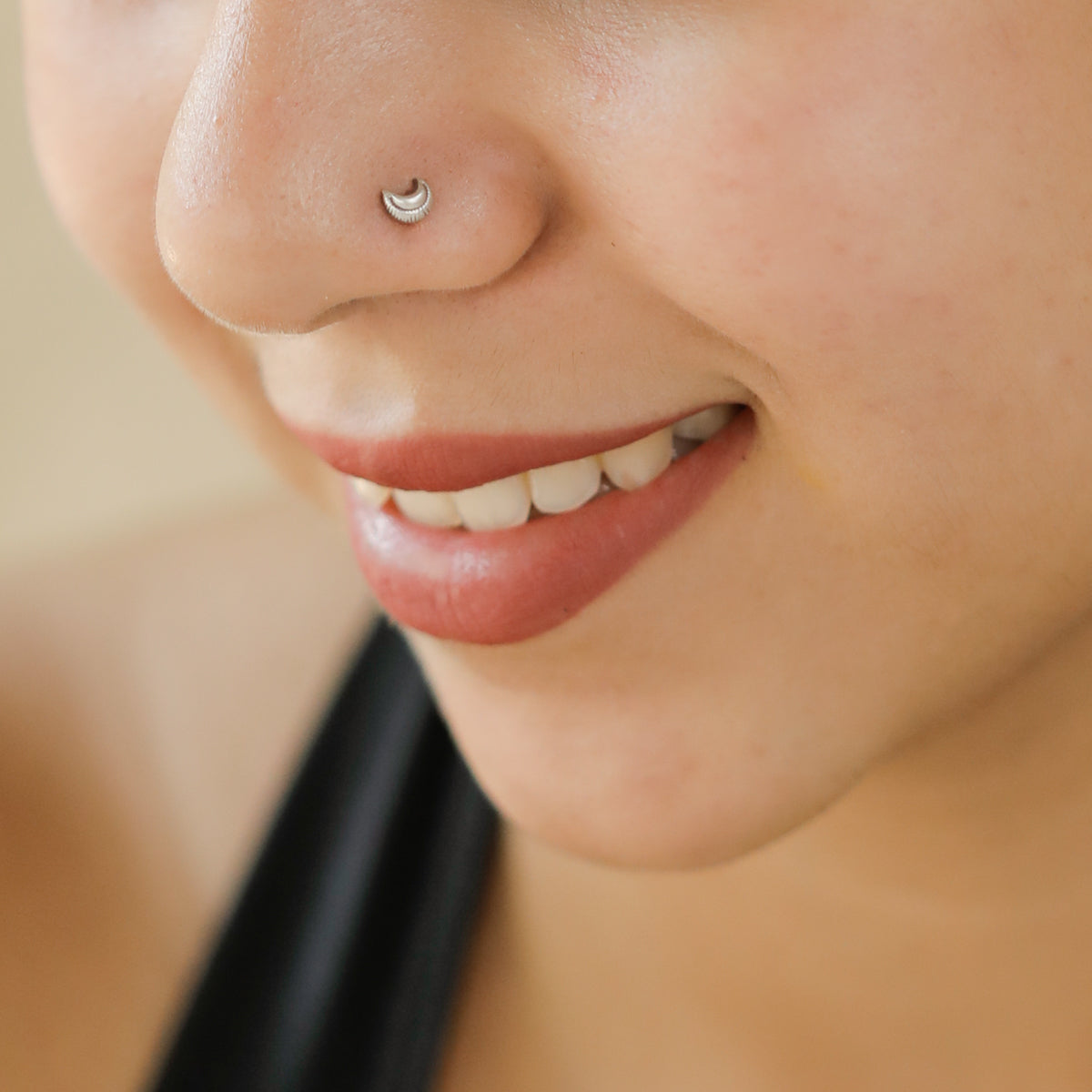 Model wearing Silver Tiny Textured Chandrakor Nose Pin daily