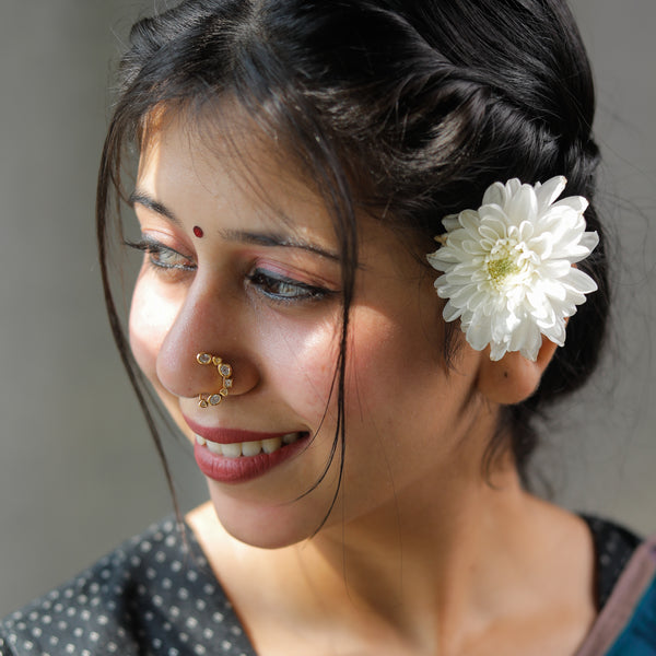 white stone detailing on gold plated small CZ nath