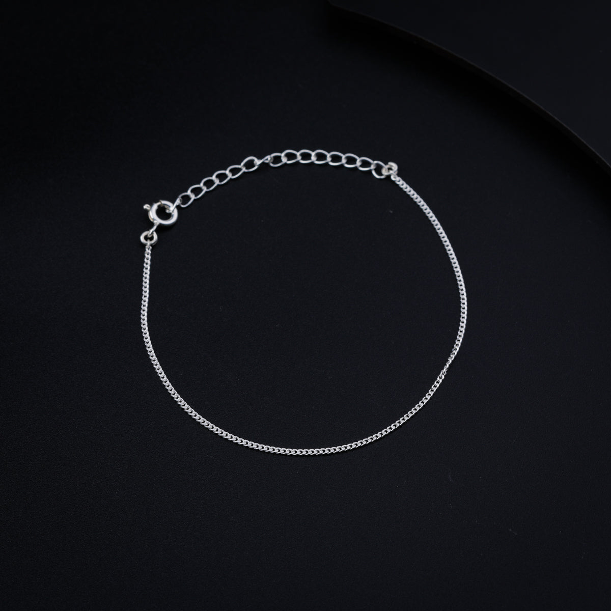 style silver chain bracelet with modern outfit