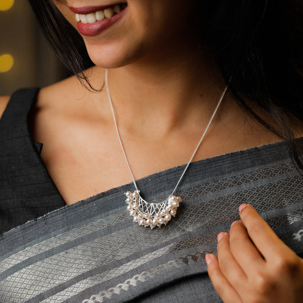 Model wearing silver chand filigree pearl necklace festive look