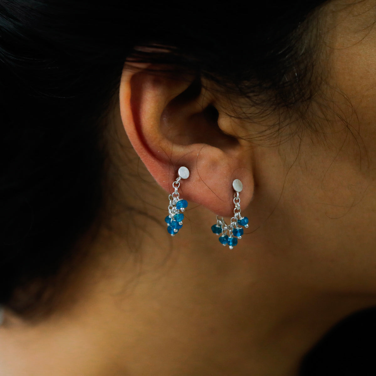 Blue apatite silver trinket earrings close-up handcrafted detailing