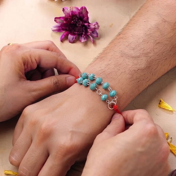 Turquoise Ganthan Rakhi (Project Handmade)