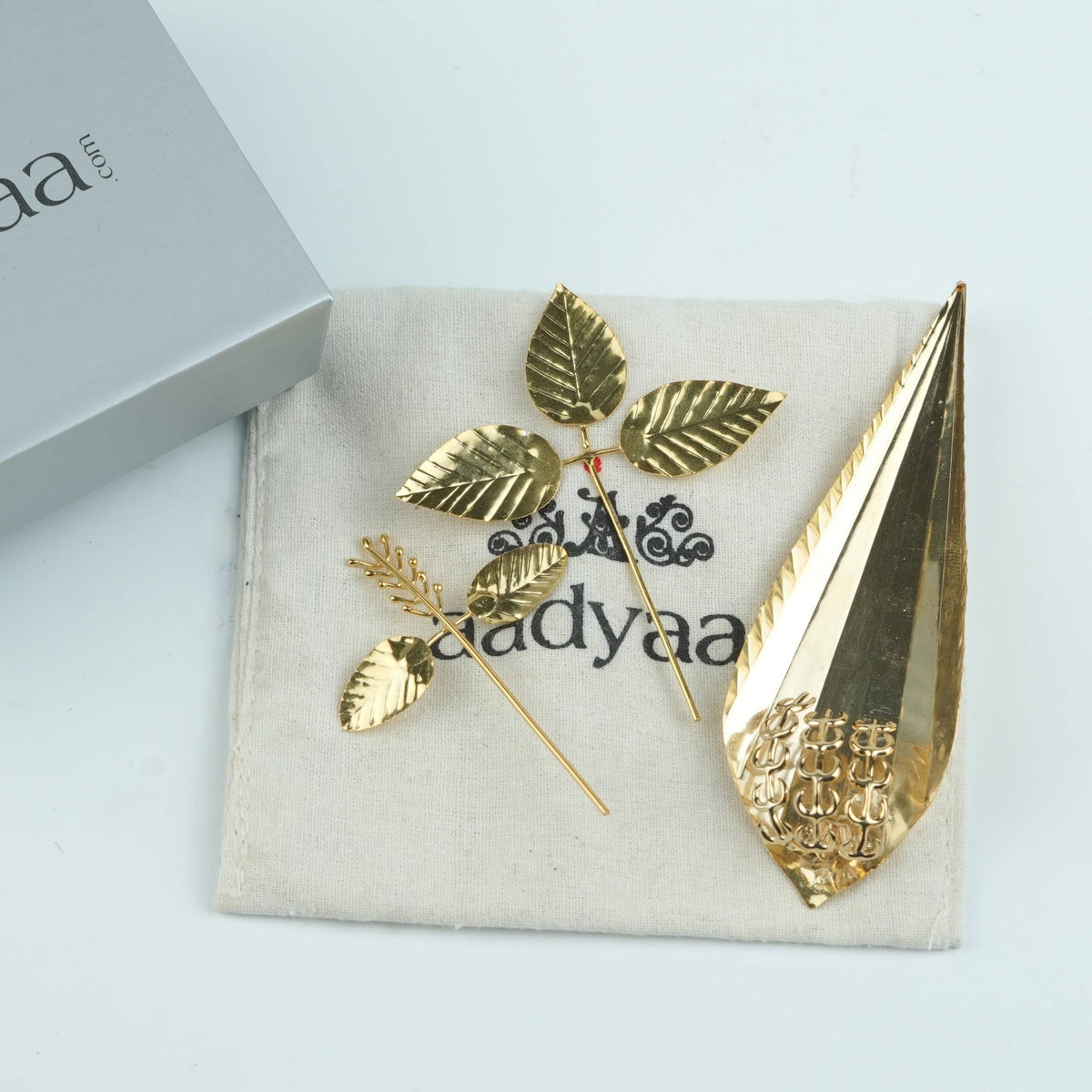 Detailed view of the Kevda, Tulsi Manjiri and Bel leaves, highlighting intricate botanical textures and refined 22K Gold-Plated detailing