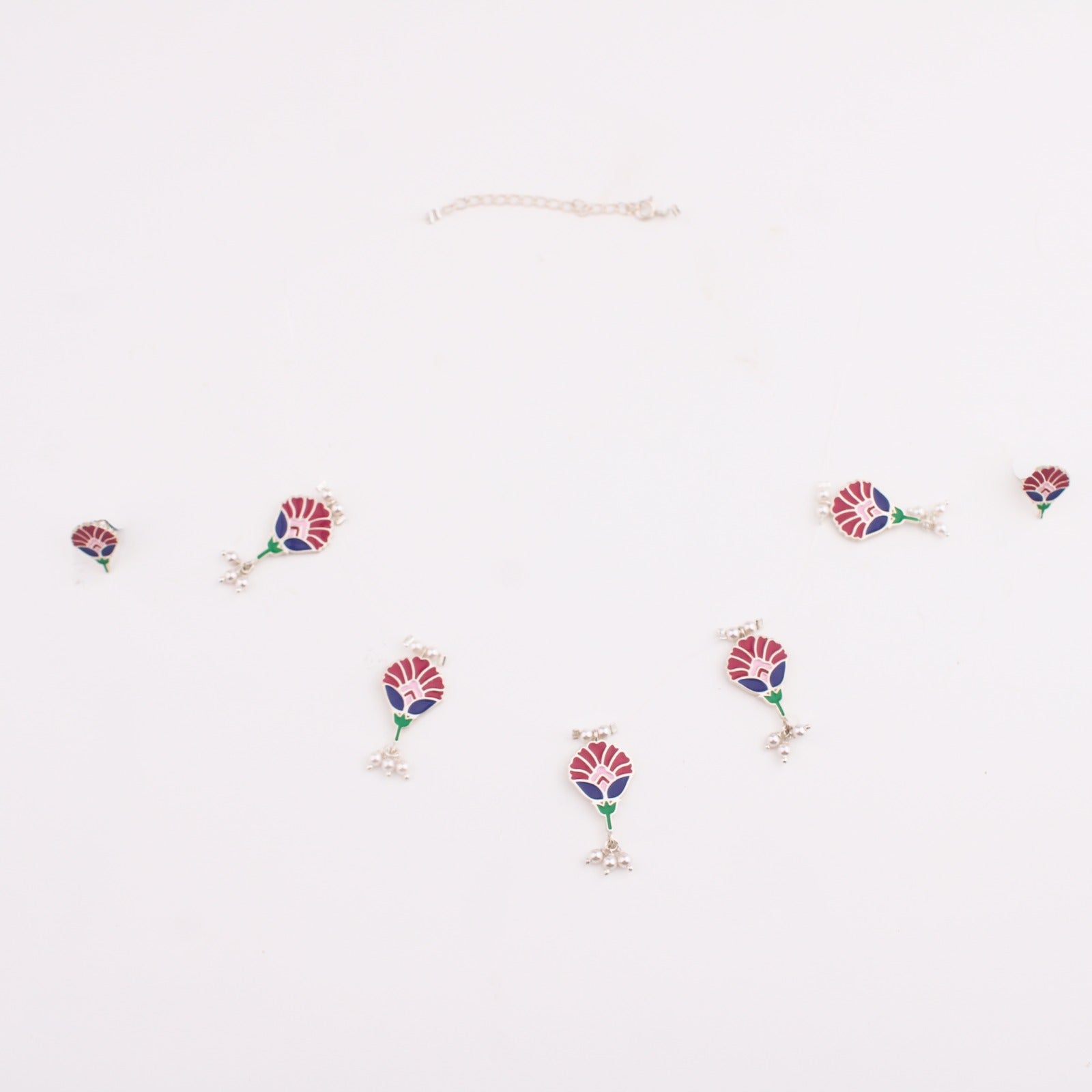 Meena charm set with invisible thread