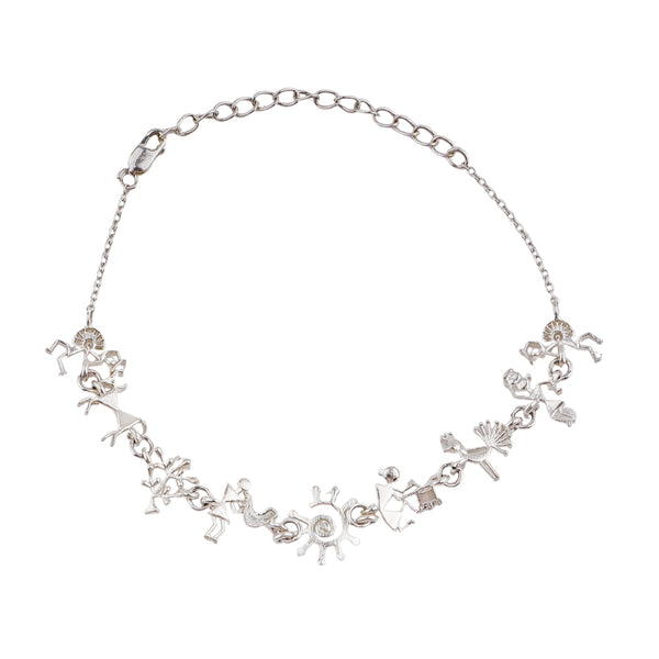 Silver bracelet with Warli motifs, tribal art jewelry, intricate silver design