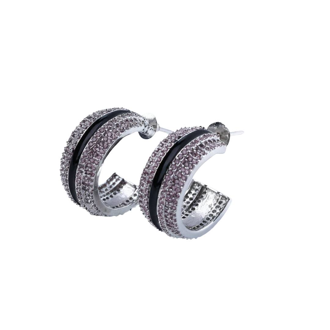 Fashion earrings in front view featuring a stylish design and elegant jewelry finish