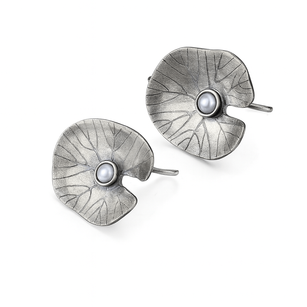 Sterling silver earrings with pearl accents