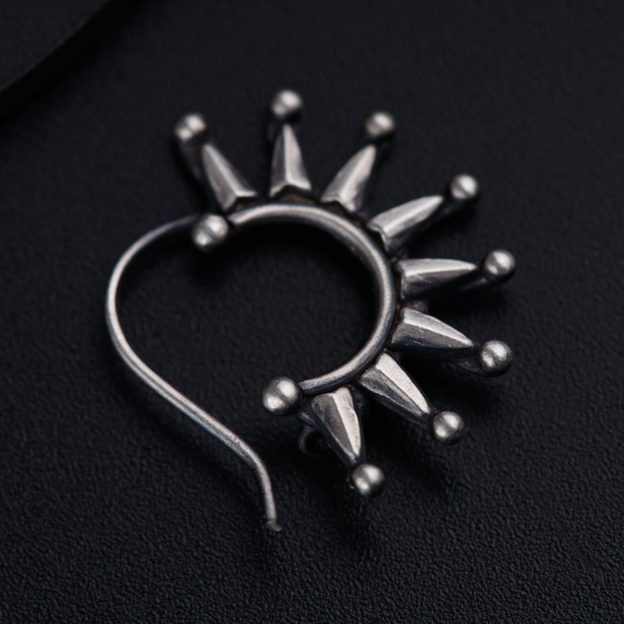 a metal ring with spikes on it