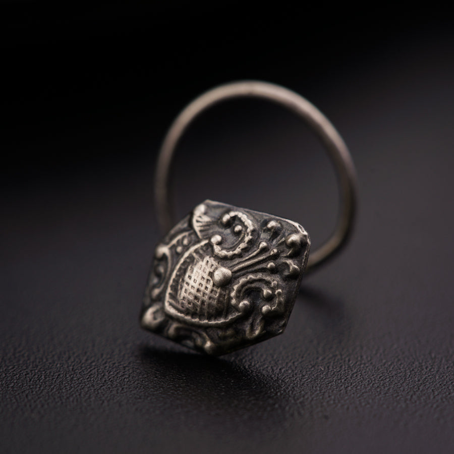 a close up of a ring on a table