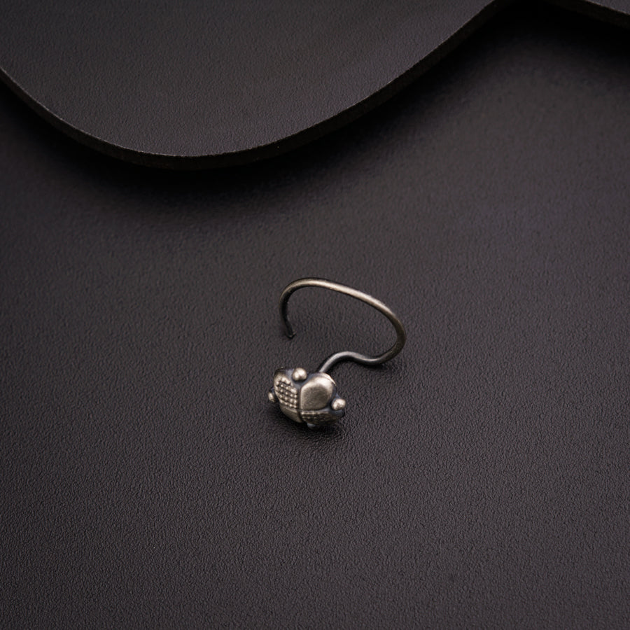 a silver ring with a skull on it