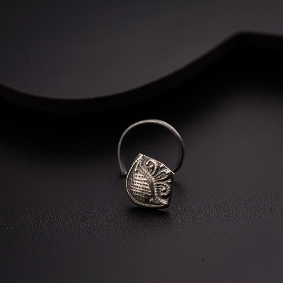 a close up of a ring on a table