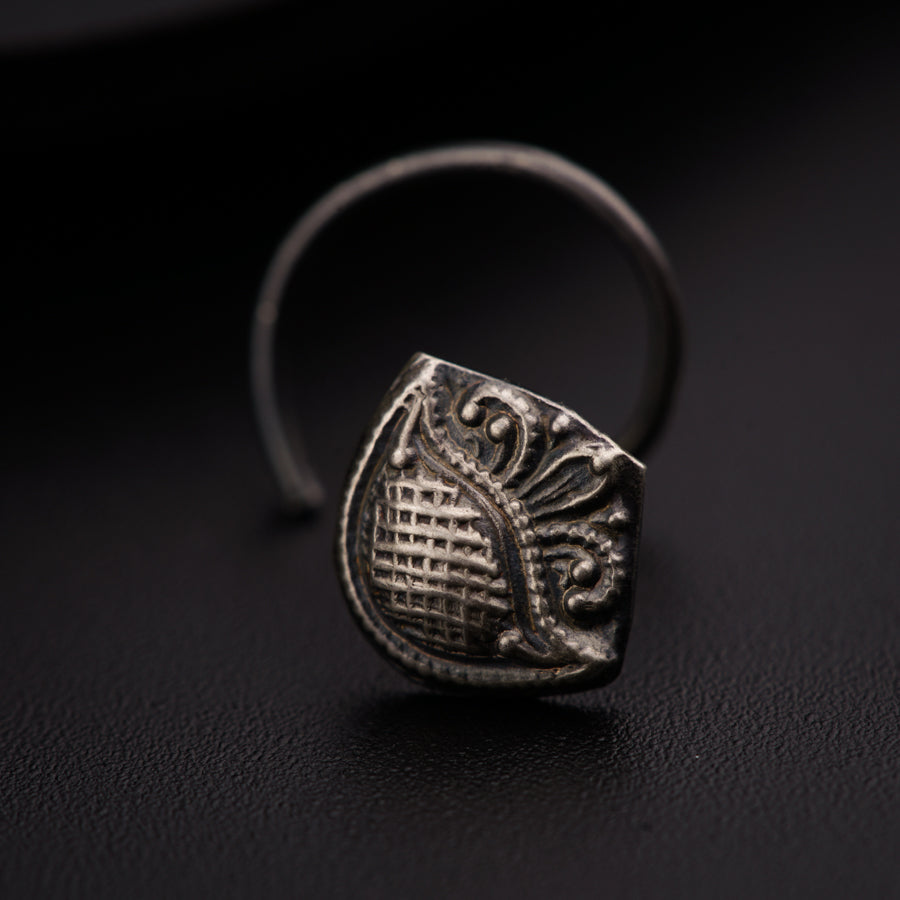 a close up of a ring on a table