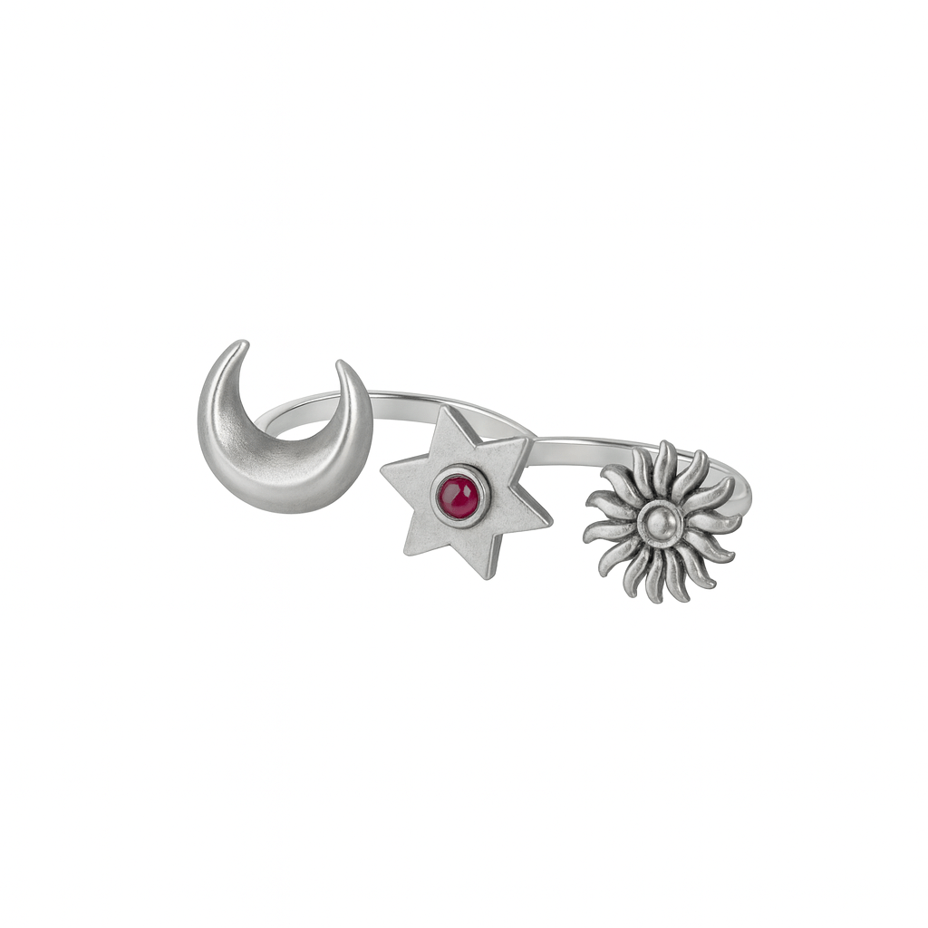 Moonlite Two Finger Ring with crescent moon, star with red gemstone, and sun design in sterling silver