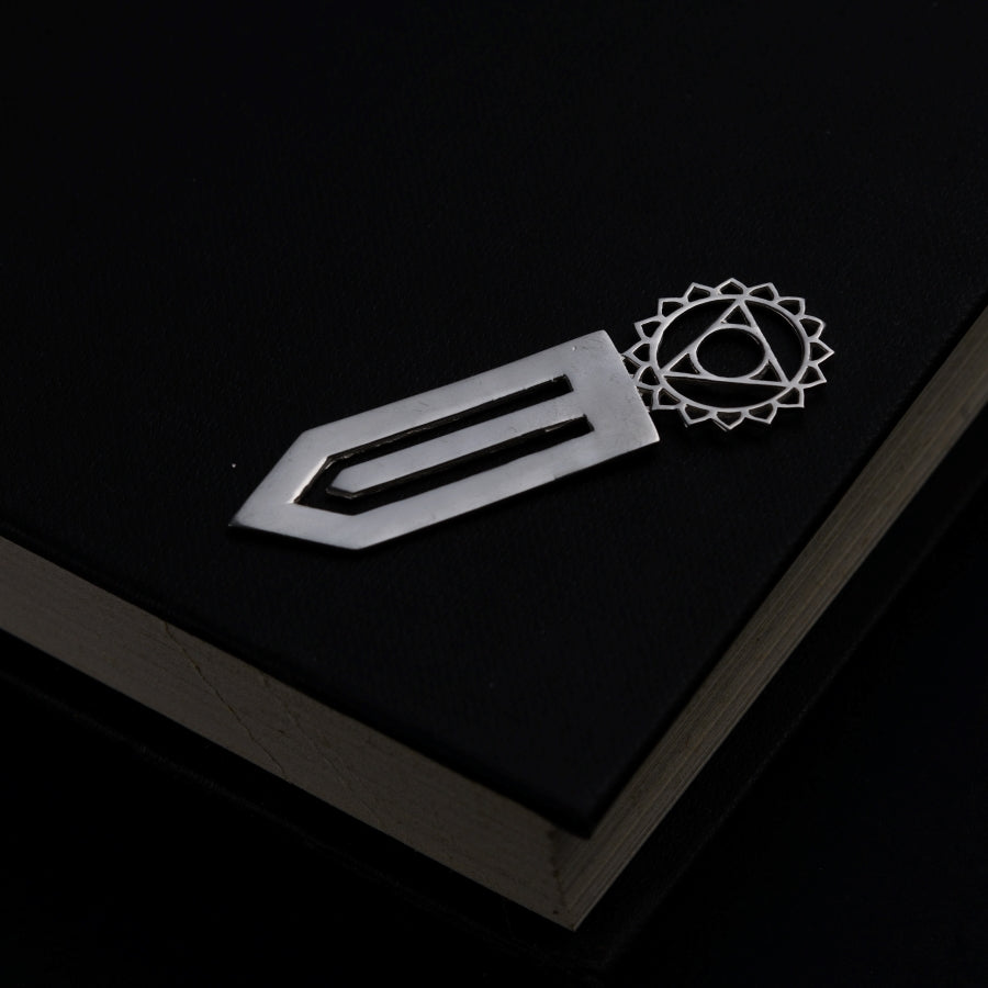 a book with a knife on top of it