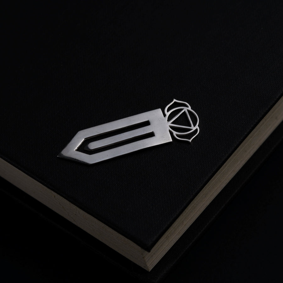 a book with a knife on top of it