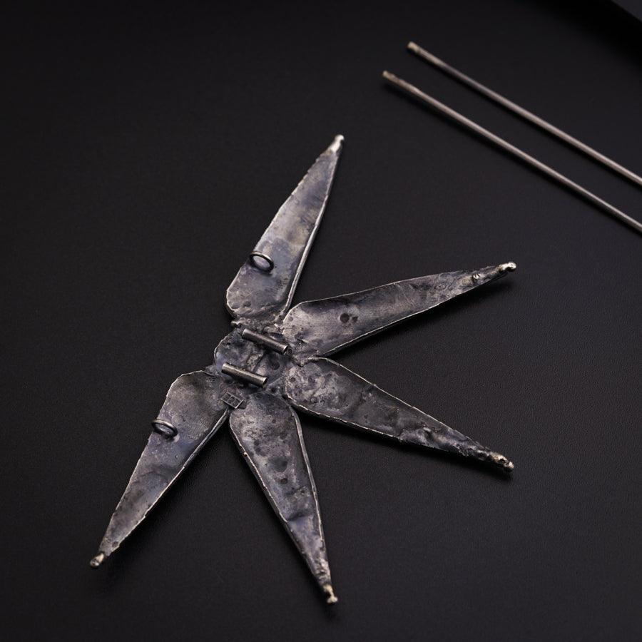 a pair of scissors sitting on top of a table