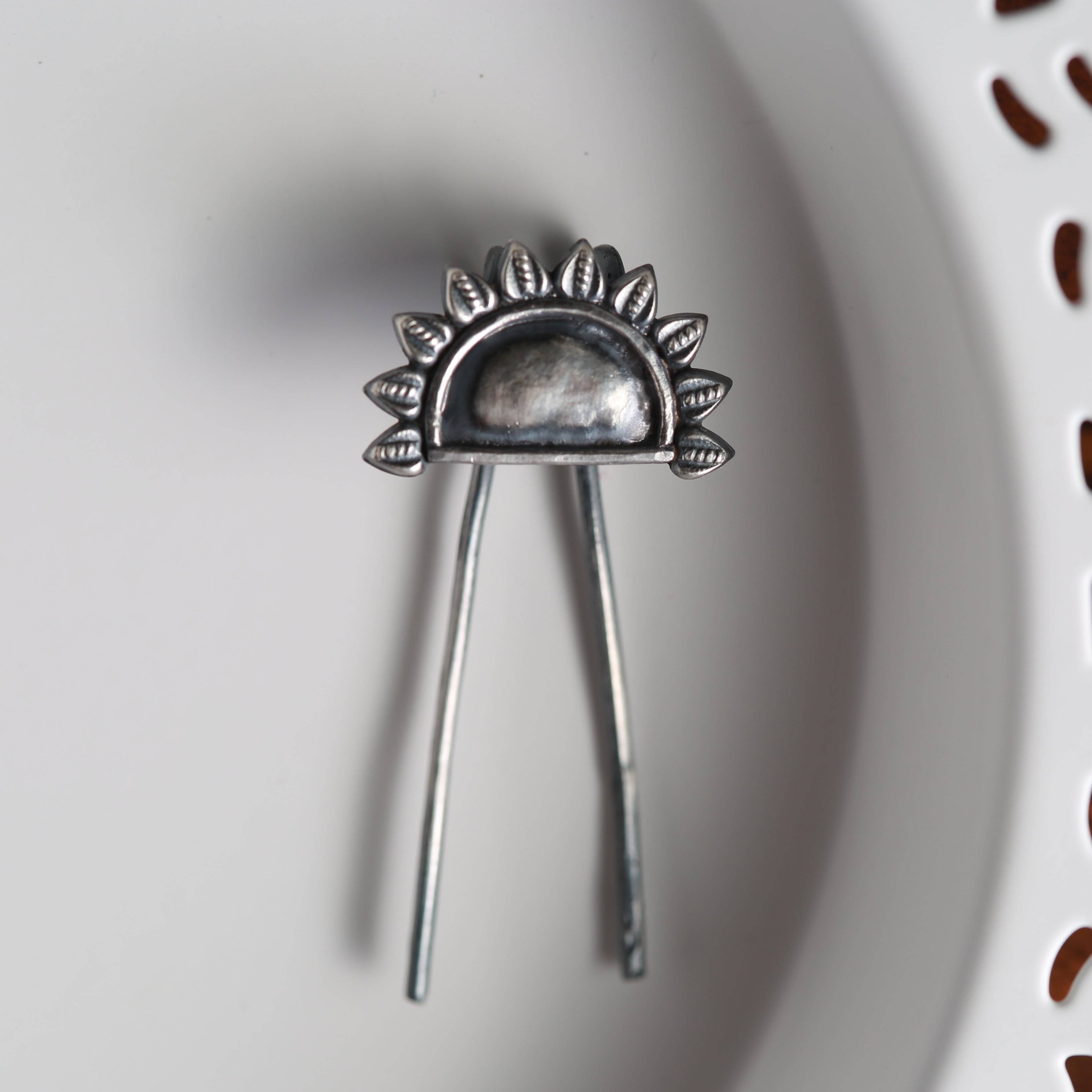 a spoon and spoon rest on a white plate