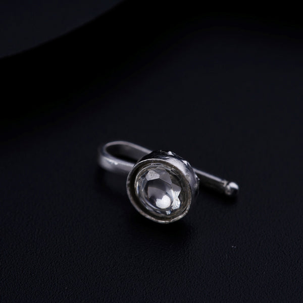a close up of a ring on a black surface