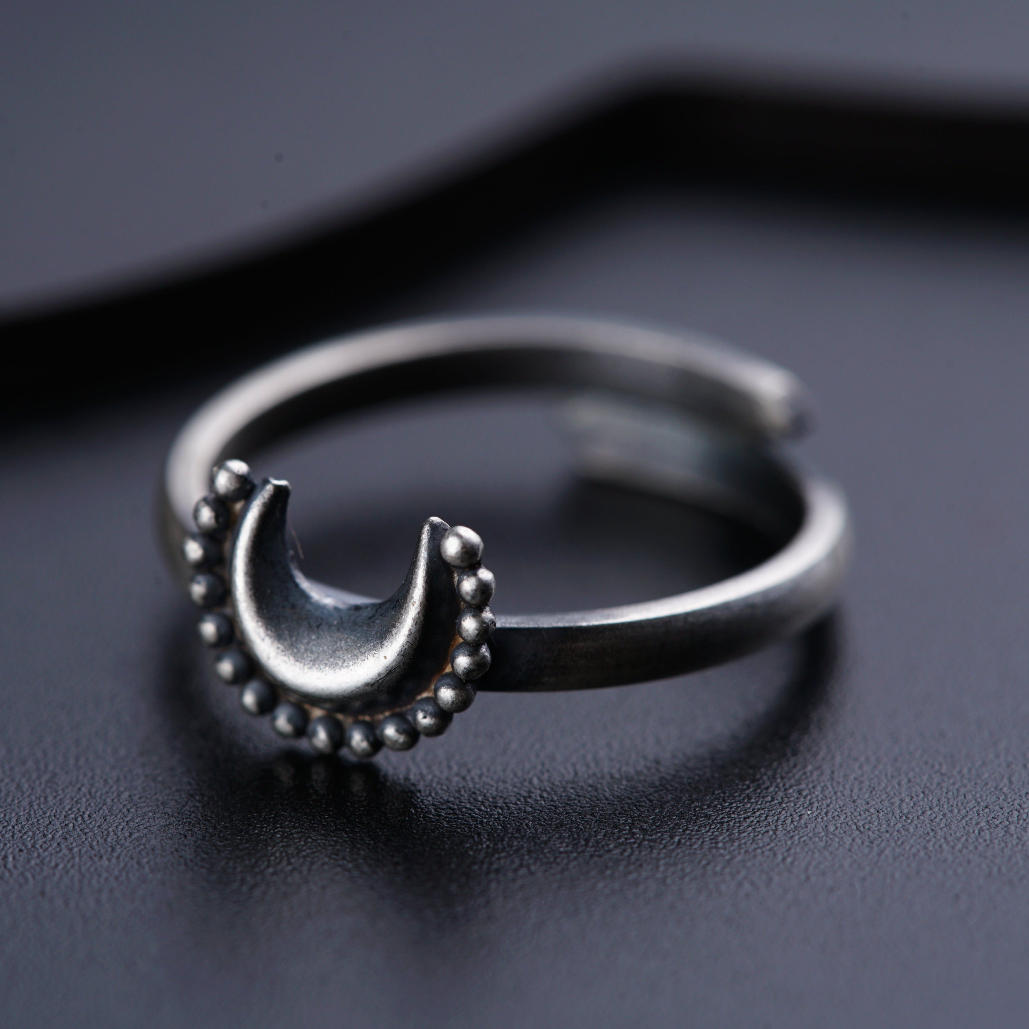 a close up of a ring on a table