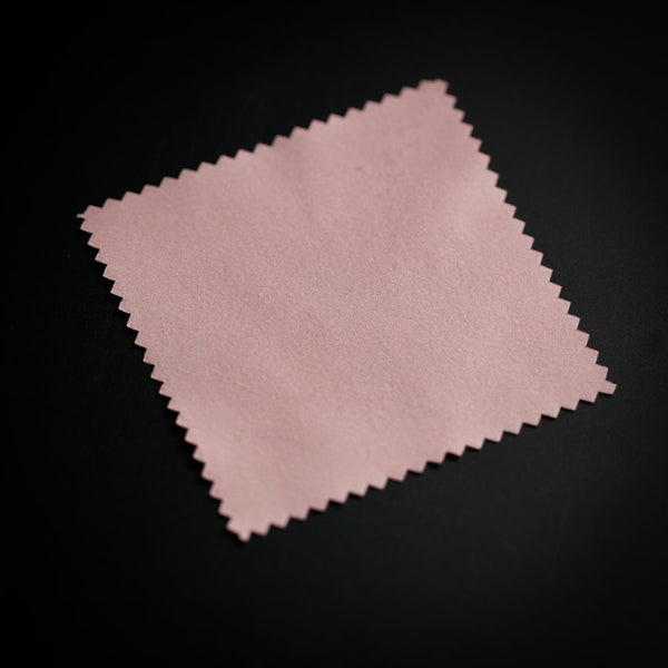 a close up of a cloth on a black surface