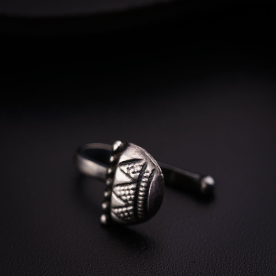 a close up of a ring on a table