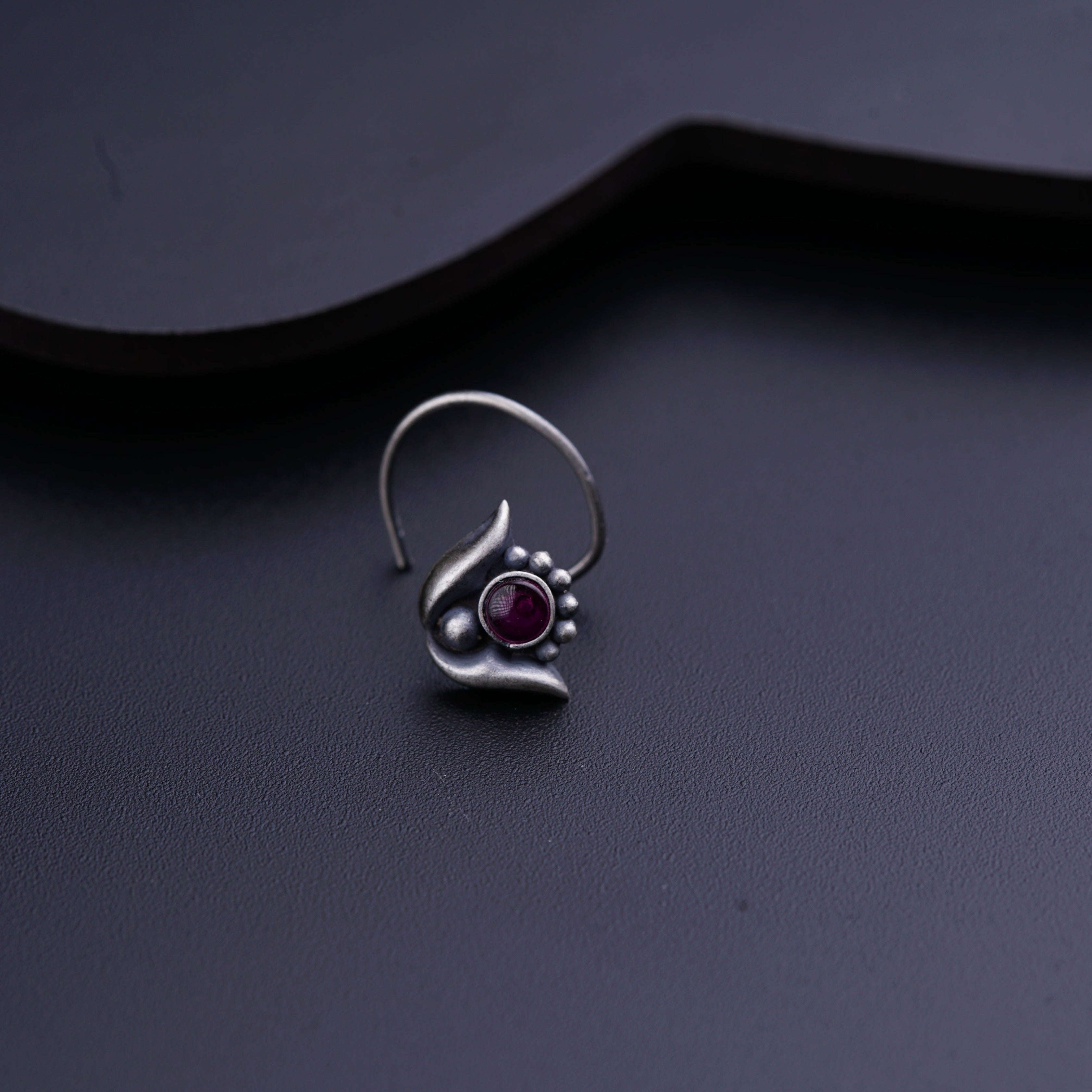 a close up of a ring on a table