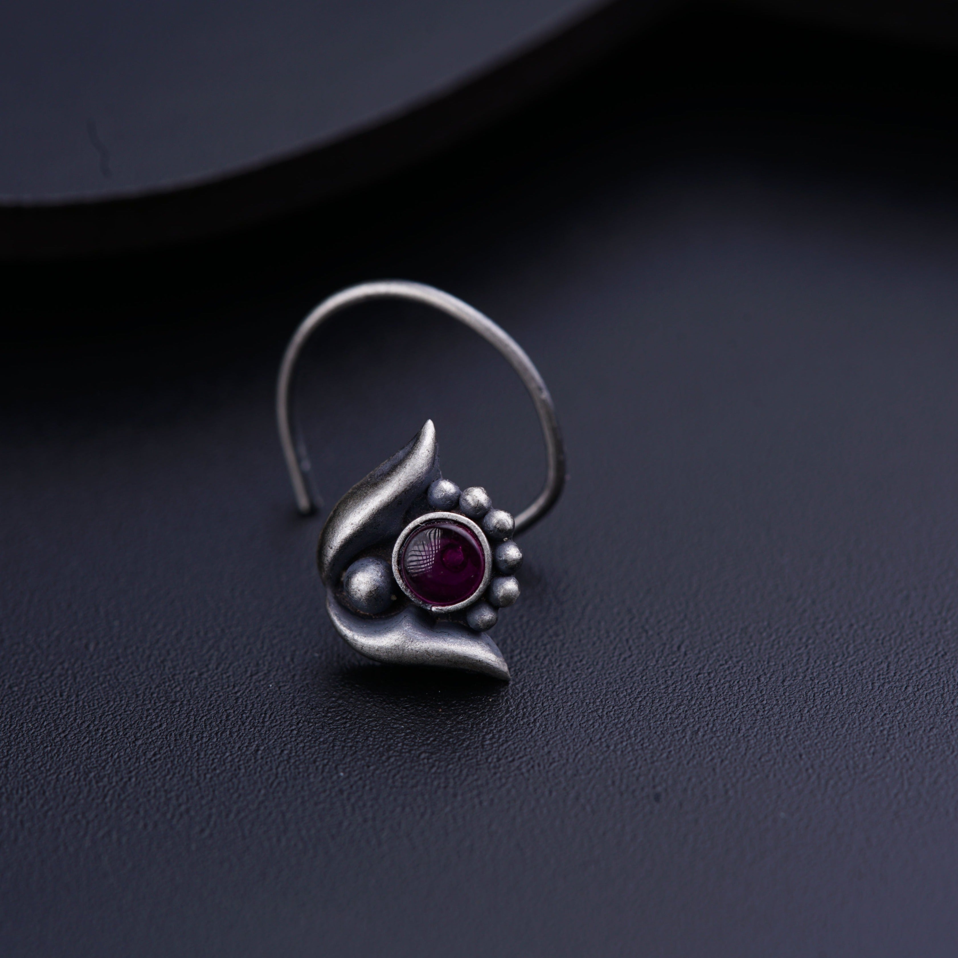 a close up of a ring on a table