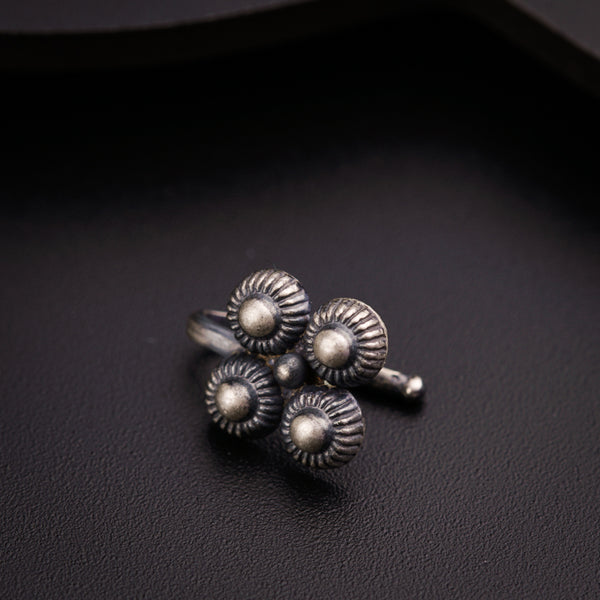 a close up of three rings on a black surface