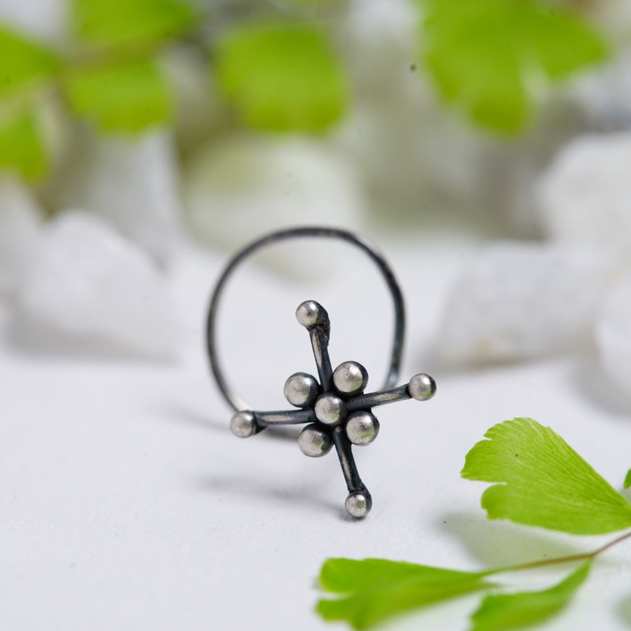 a close up of a ring on a table