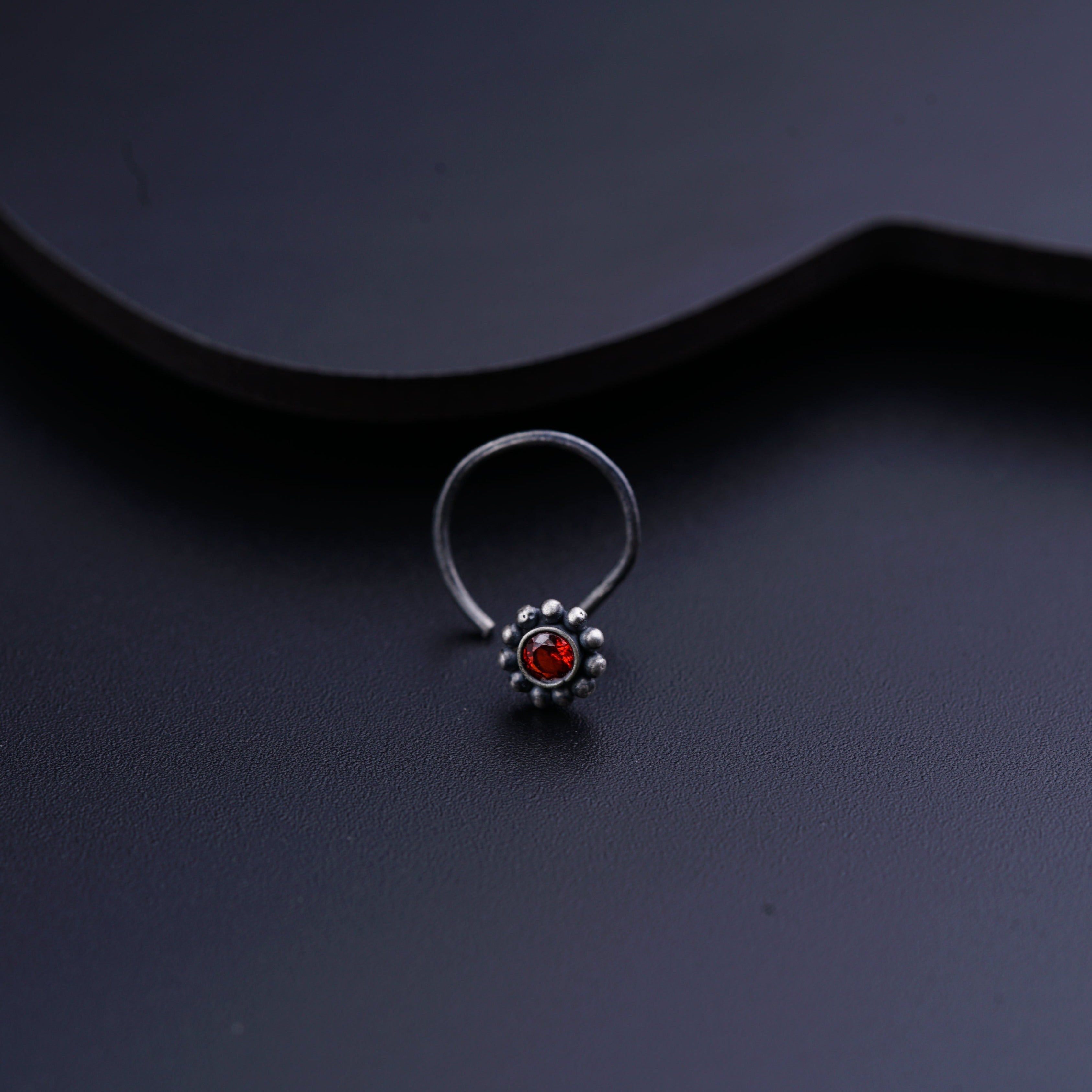 a close up of a ring on a table