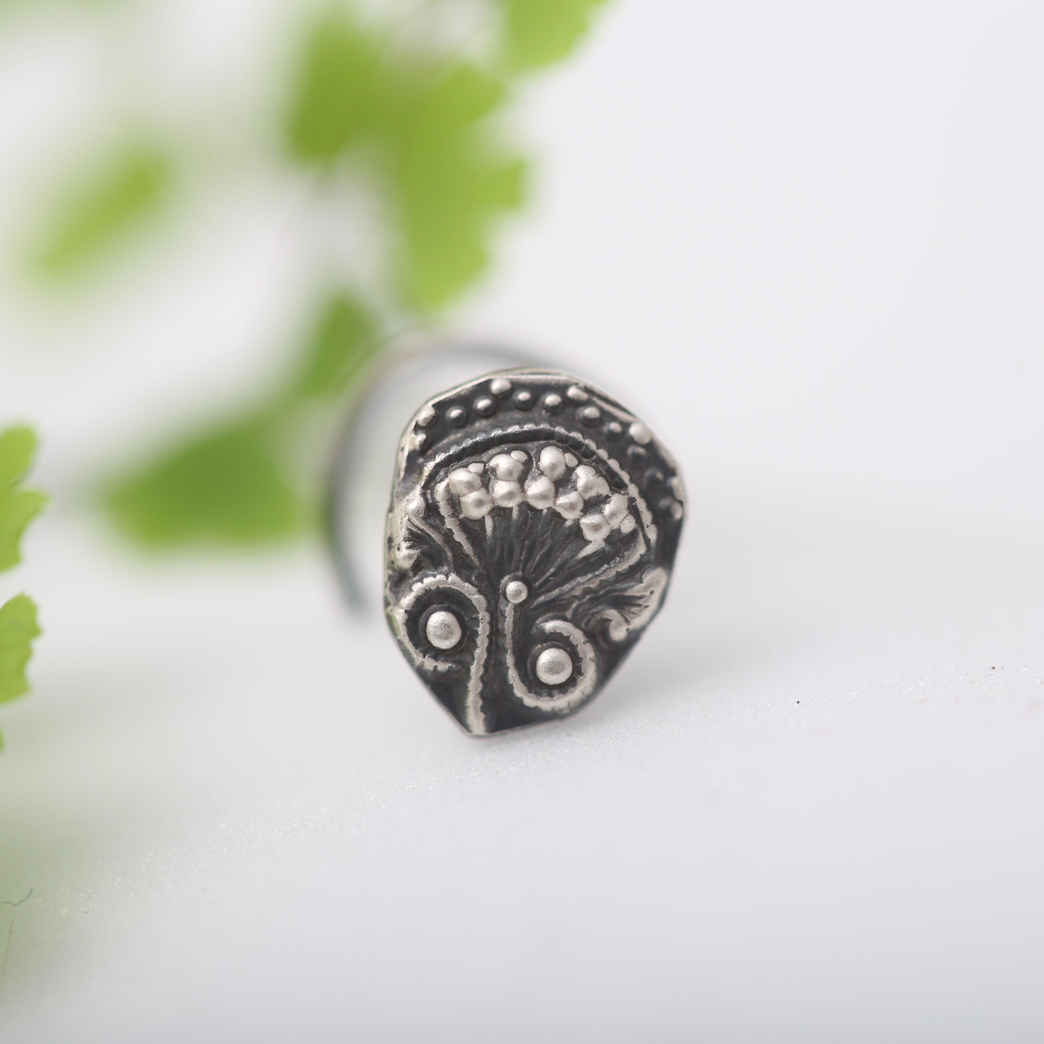 a close up of a ring on a table