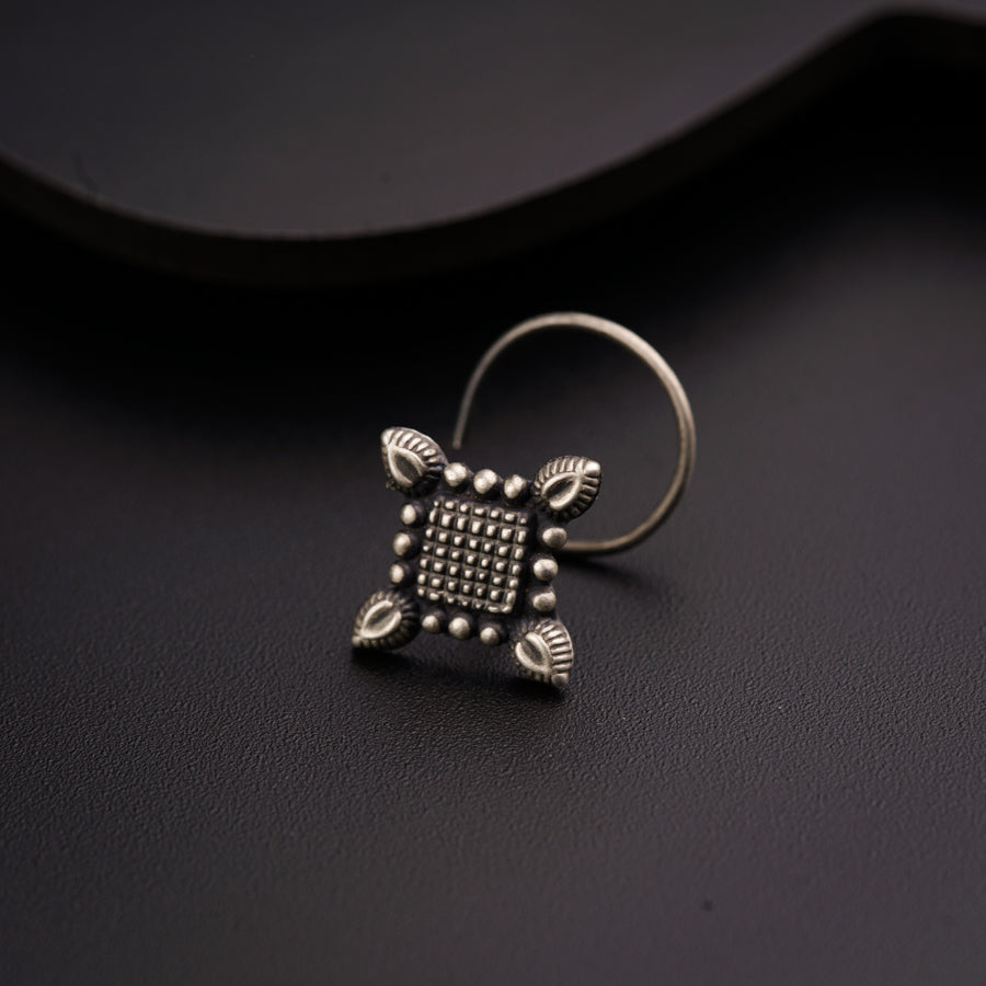 a close up of a ring on a table