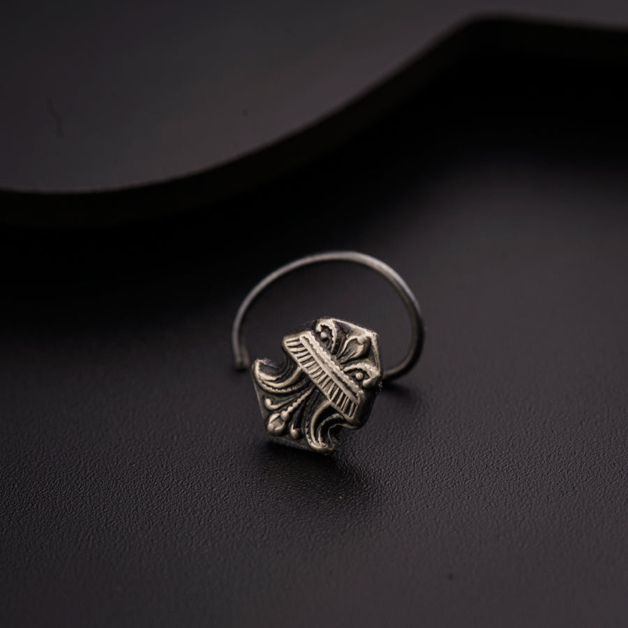 a close up of a ring on a table