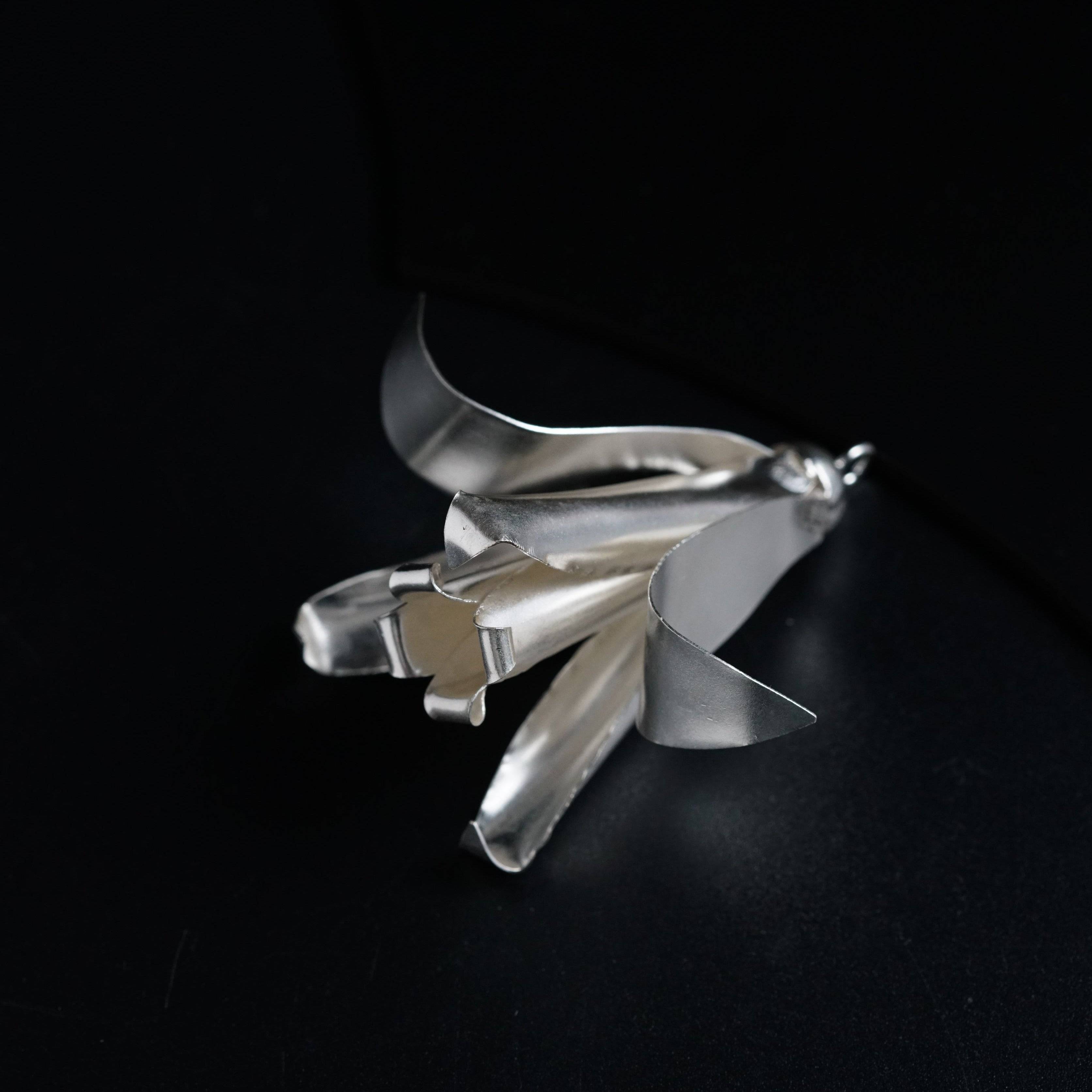a metal object sitting on top of a table